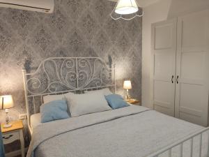 Ein Bett oder Betten in einem Zimmer der Unterkunft Luka