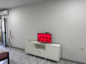 TV a/nebo společenská místnost v ubytování Apartment in New Boulevard