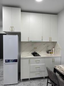 Kuchyň nebo kuchyňský kout v ubytování Apartment in New Boulevard