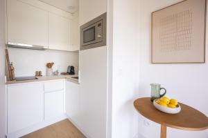 Kuchyň nebo kuchyňský kout v ubytování Babel Community Hôtel Lille - Villeneuve d'Ascq