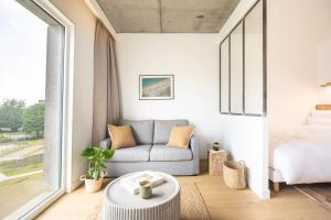 Posezení v ubytování Babel Community Hôtel Lille - Villeneuve d'Ascq