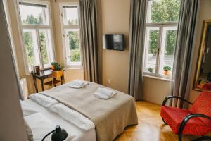 Televízia a/alebo spoločenská miestnosť v ubytovaní Bed&Breakfast & Apartment Klafé