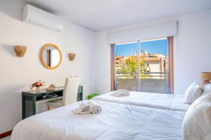 Bellavista Avenida By BeGuest客房内的一张或多张床位