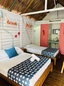 Postel nebo postele na pokoji v ubytování Hotel Las Casitas De Mar Adentro