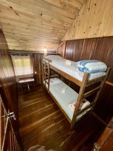 Postelja oz. postelje v sobi nastanitve Hostel Chápada Dos Veadeiros