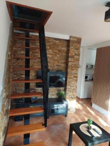 Телевізор і / або розважальний центр в Apartman Šapat bora