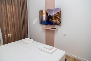 TV o dispositivi per l'intrattenimento presso Solis Giselle Hotel