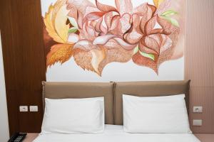 Letto o letti in una camera di Solis Giselle Hotel