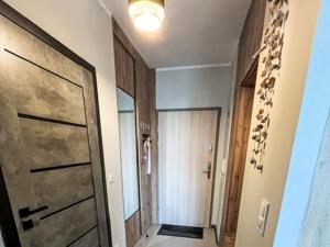 a room with a door and a hallway with a door at Apartment Gąski by Interhome in Gąski