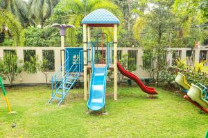 a playground with a slide and a slideintend at The Loft at Elixia in Sri Jayewardenepura Kotte
