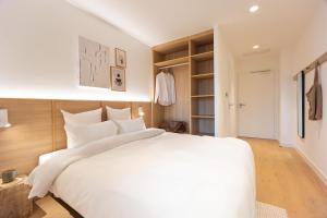 Postel nebo postele na pokoji v ubytování Babel Community Hôtel Lille - Villeneuve d'Ascq