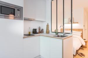 Kuchyň nebo kuchyňský kout v ubytování Babel Community Hôtel Lille - Villeneuve d'Ascq