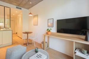 TV a/nebo společenská místnost v ubytování Babel Community Hôtel Lille - Villeneuve d'Ascq