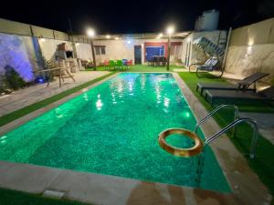 Bazén v ubytování شاليه الريف - البحر الميت - النهضة Chalet Al-Reef - DeadSea - Al-Nahda nebo v jeho okolí