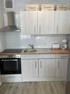 Kuchyň nebo kuchyňský kout v ubytování Beach House Yyteri