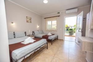 Postel nebo postele na pokoji v ubytování Babis House