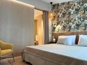 Posteľ alebo postele v izbe v ubytovaní Hotel Mercury by ALEGRIA