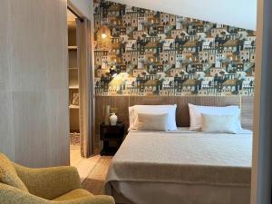 Posteľ alebo postele v izbe v ubytovaní Hotel Mercury by ALEGRIA