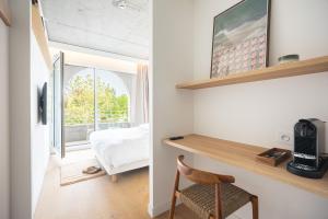 TV a/nebo společenská místnost v ubytování Babel Community Hôtel Lille - Villeneuve d'Ascq