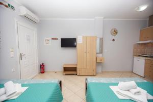 Postel nebo postele na pokoji v ubytování Babis House