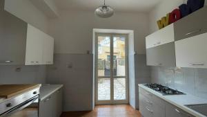 Кухня или мини-кухня в Acqua e sale - Anzio centro
