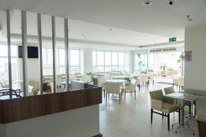 SM1116 Apart Hotel em andar alto região central餐厅或其他用餐的地方