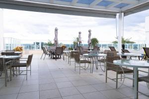 SM1116 Apart Hotel em andar alto região central餐厅或其他用餐的地方