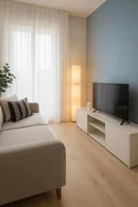 Μια τηλεόραση ή/και κέντρο ψυχαγωγίας στο Intero Apt Padova - Free Parking - WiFi - Aria Condizionata - Oasi Padova +15 φωτογραφίες