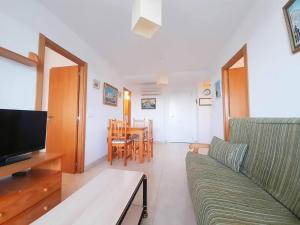 TV a/nebo společenská místnost v ubytování Ayf colomeras espacioso playa morro de gos