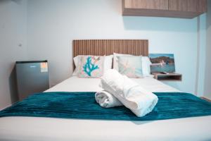 Postel nebo postele na pokoji v ubytování Mangrove Bay Hotel San Andrés Islas
