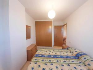 Postel nebo postele na pokoji v ubytování Ayf colomeras espacioso playa morro de gos