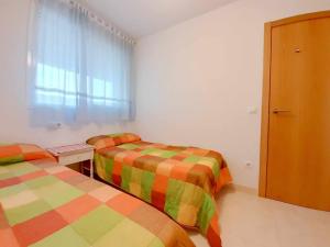 Postel nebo postele na pokoji v ubytování Ayf colomeras espacioso playa morro de gos