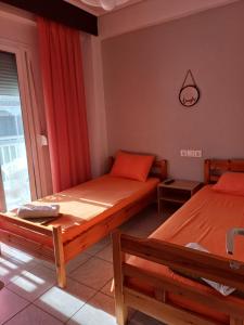 Postel nebo postele na pokoji v ubytování Savvas