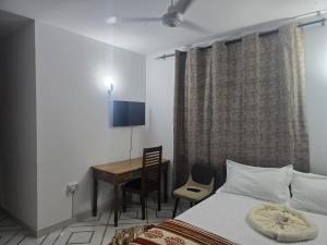 TV a/nebo společenská místnost v ubytování Dianite homes