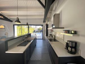 Køkken eller tekøkken på La Villa de l Ancre Marine