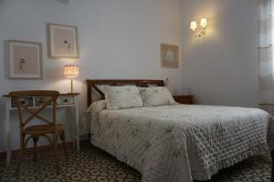 Postel nebo postele na pokoji v ubytování Montserrat Casa del Mar