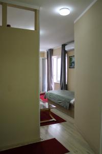 Ένα ή περισσότερα κρεβάτια σε δωμάτιο στο Bed and Breakfast Majesty