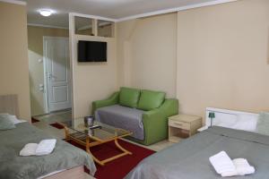 Ένα ή περισσότερα κρεβάτια σε δωμάτιο στο Bed and Breakfast Majesty