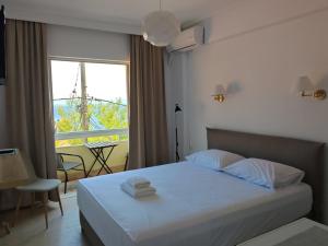 Postel nebo postele na pokoji v ubytování Hotel Rania