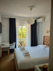 Postel nebo postele na pokoji v ubytování Hotel Rania