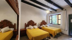 Postel nebo postele na pokoji v ubytování Hotel Sautto + 37 fotografií