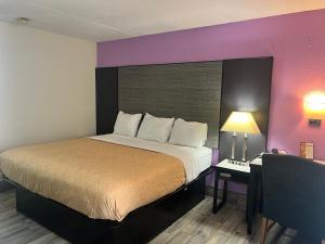 Postelja oz. postelje v sobi nastanitve Super Inn