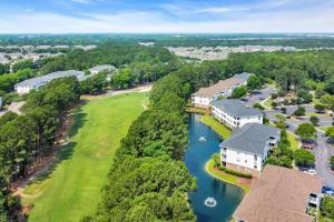 an aerial view of a home with a river at Angie's Place w Golf Views Plus Huge Resort Pool in North Myrtle Beach