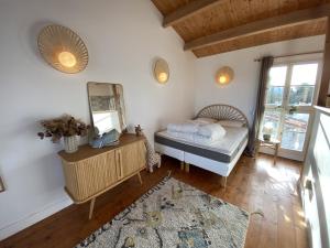 Postel nebo postele na pokoji v ubytování La Maison du Gillieux + 11 fotografií