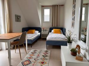 Postel nebo postele na pokoji v ubytování Ferienhaus Auszeit