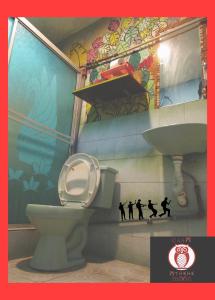 a bathroom with a toilet and a sink at Athene Moon in Juivi +43 photos