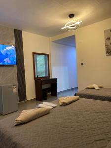Postel nebo postele na pokoji v ubytování Eden Hotel