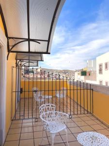 Un balcon sau o terasă la Hotel Casa Cortes