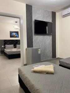 Postel nebo postele na pokoji v ubytování Eden Hotel