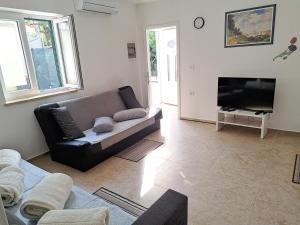 TV in/ali zabaviščno središče v nastanitvi apartmaji strunjan